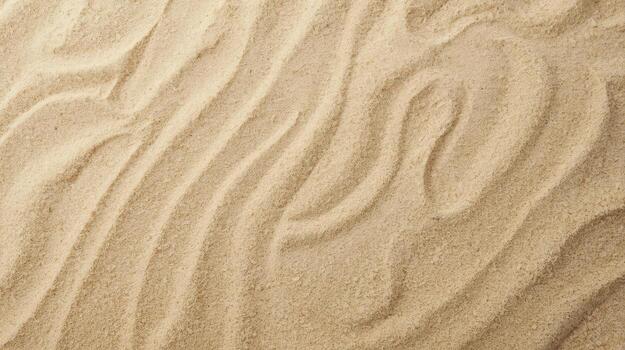 Close up of natural light creating patterns and designs in sand at the beach showing beautiful tan colors and textures of the beach landscape. photo