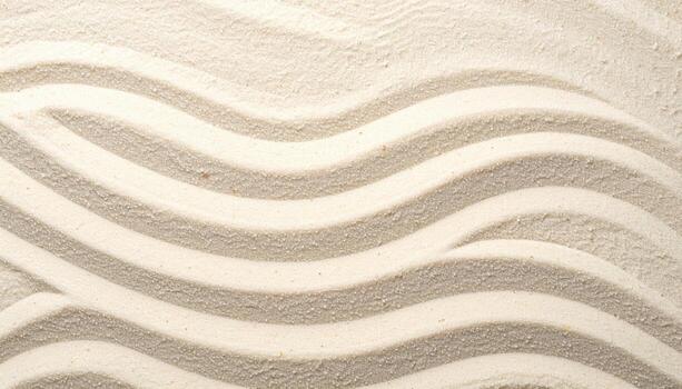 The rippled sand surface showcases a serene and calming texture creating an abstract minimalist background perfect for various creative projects. photo