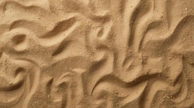 parte superior ver de dorado playa arena con ondulado patrones y texturas creado por viento y agua resultante en un natural resumen antecedentes. foto