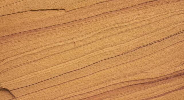 The natural patterns of sandstone layers create a beautiful geological texture with flowing lines and earth toned colors, presenting a smooth surface. photo
