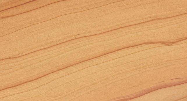 The smooth surface of the light brown wooden plank features a natural, flowing grain pattern with subtle variations in color and texture. photo