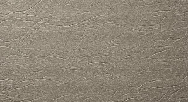 The intricate patterns of wrinkled beige paper create an abstract textured background that is ideal for graphic design and artistic projects. photo