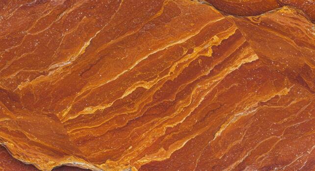 The striking red rock surface displays intricate layers and textures creating a visually appealing and earthy geological formation outdoors now. photo