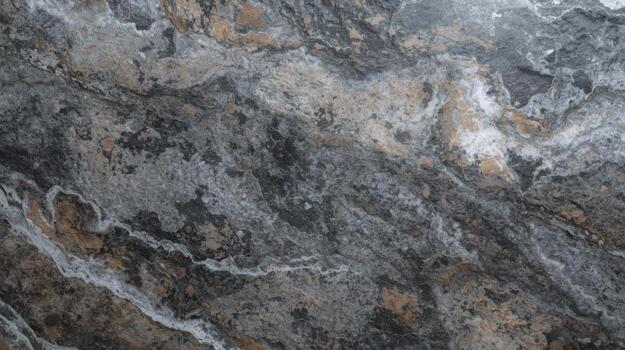 A textured marble stone surface shows complex layers with shades of gray, brown, and white creating abstract patterns perfect for backdrops. photo