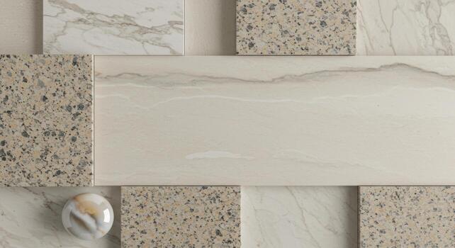 An arrangement of stone and marble tiles in neutral tones creates a textured background suitable for design mockups and architectural projects. photo