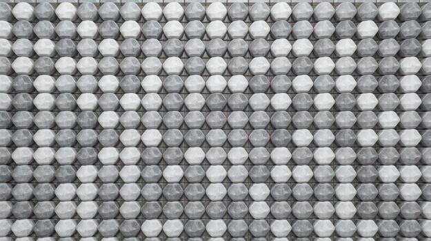 Dodecahedrons arranged in neat rows form an interesting geometric pattern with shades of gray, creating abstract and repetitive background. photo
