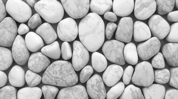A monochromatic background of smooth, rounded stones creates a calming and natural texture that is perfect for design and presentations. photo