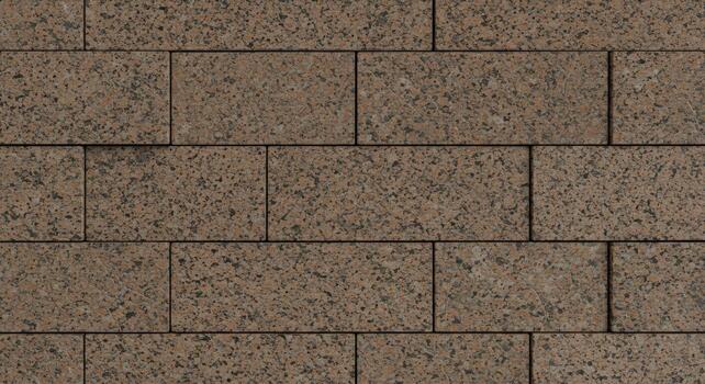The dark brown granite block wall presents a textured surface perfect for backgrounds or creating realistic architectural rendes seamlessly. photo