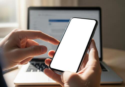 persona utilizando un teléfono inteligente con un ordenador portátil en el antecedentes foto