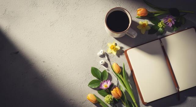 Morning Coffee, Open Book, and Spring Flowers on a Textured Surface. photo
