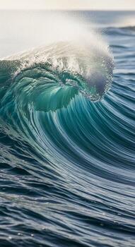 Majestic ocean wave crests and curls with translucent turquoise water illuminated by soft sunlight creating a powerful natural spectacle photo