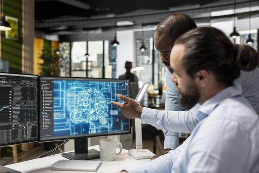 Team of stockbrokers running AI technology on PC to do automated trading and portfolio rebalancing. Prop firm coworkers applying machine learning algorithms to analyze complex market data photo