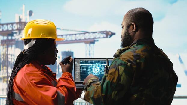 Military unit on offshore rig using artificial intelligence automated counter terrorism systems. Soldier provides protection to drilling barge using AI neural network surveillance systems photo