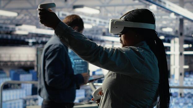 Software developer in server room wearing VR goggles optimizing deep learning systems handling tasks. African american woman in data center adjusts AI model parameters using virtual reality, camera B photo