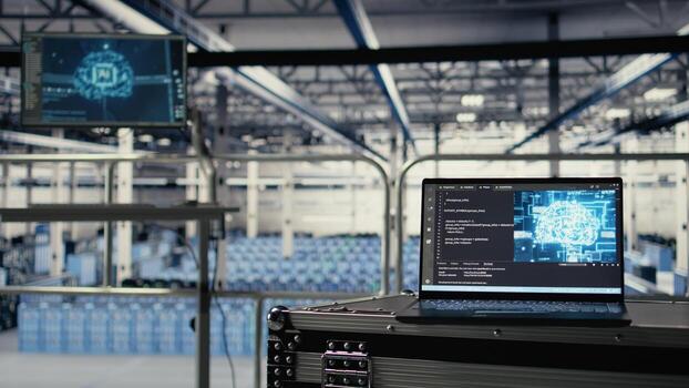 Neural networks tech on notebook in industrial data center facility helping power online websites. AI coding script running on laptop in server farm built for platforms hosting cloud services photo