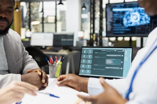 Diverse hiring team employing machine learning software for profile evaluation, scanning applicant data and helping HR staff in decision making. Selecting the right person for a key position. photo