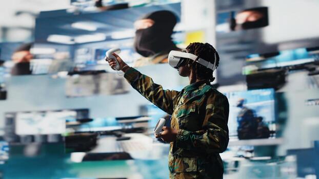 Air defense commander using radar systems and virtual reality tech to detect incoming ballistic missiles. Army soldier in base of operations scanning enemy rockets using VR headset gear, camera B photo