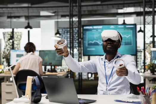 Black man in office exploring data analysis and financial evaluations with VR headset. African american corporate worker using virtual reality technology during innovative business project planning photo