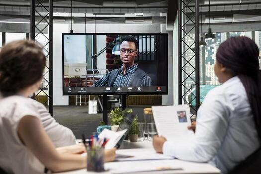 Confident job seeker joining a virtual call interview with human resources staff via remote connection, discussing about qualifications in order to fill in the position, career opportunity. photo