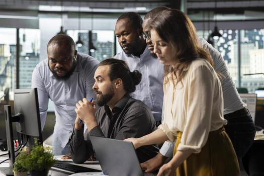 Employees and coworkers discussing business intel and performance metrics in meeting. Multinational company work team reviewing reports, forecasts and diagrams to align strategy. photo