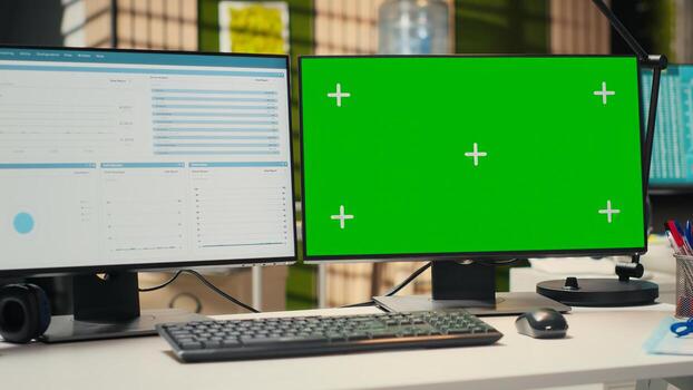 Empty company office features digital resources and mockup on monitor, workspace ready for report writing, strategy development and alignment of organizational goals achievement. photo