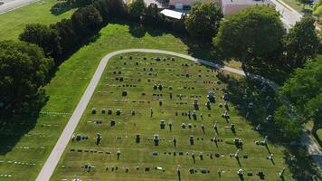 Drone view showing rows of tombs and place of sorrow and memory. Cemetery on bright sunny day video