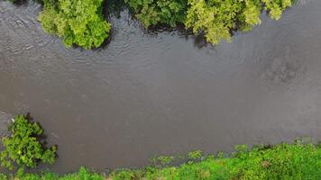 Drone view of the flooding river. Water level in the river reaching high level caused by heavy rains, View from above video