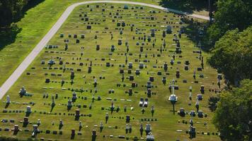 A drone view showing rows of tombs, place of sorrow and memory. Cemetery view on bright sunny day video