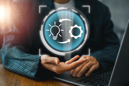 Visual representation of the implementation process featuring gear and lightbulb icons, symbolizing innovation and execution. photo