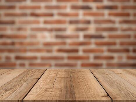 An empty rustic wooden table with a blurred background of a red brick wall. For product display. photo