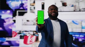 Digital world showing black user navigating visualized data and mockup, apps and social networks with mobile technology. Man showcasing influencer culture and global engagement. Camera B. video