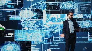 IT engineer hosting public speaking event to present new AI tech tools, showcasing neural networks brain system for automation. Businessman speaker gives pitch for deep learning. Camera B. video