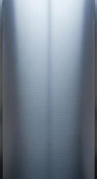 Abstract brushed metal texture with subtle light reflections creating a cool modern and industrial background effect photo