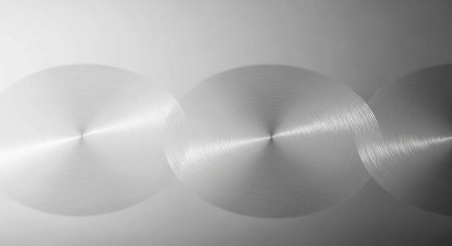 Abstract background of brushed metallic circles with radial light reflections and subtle gradients photo