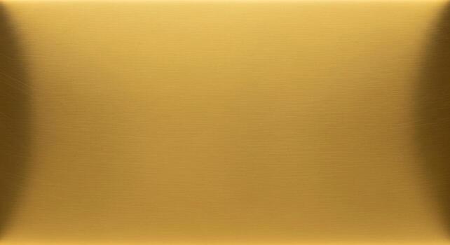 A close up abstract view of a smooth polished golden surface with subtle light reflections and shadows creating depth photo