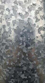 Abstract camouflage pattern with muted greens grays and blues creating a textured mottled visual effect photo