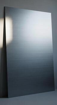 Abstract geometric composition featuring a large dark textured square panel illuminated by dramatic angled light creating subtle shadows and highlights photo