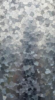 Abstract textured surface with a cool color palette of grays blues and whites creating a subtle mottled pattern photo