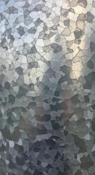 Abstract textured background with dappled light and shadow creating a mosaic of organic shapes and muted colors photo