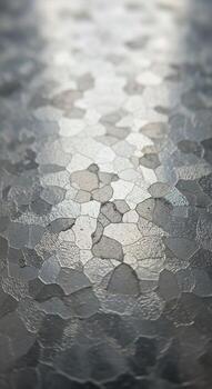 Abstract close up of textured glass reflecting diffused light creating a shimmering organic pattern of light and shadow photo