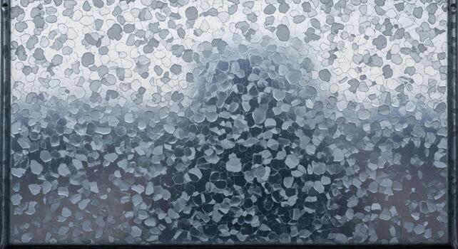 Abstract textured background with a gradient of gray and white speckled patterns creating a visually dynamic and modern aesthetic photo