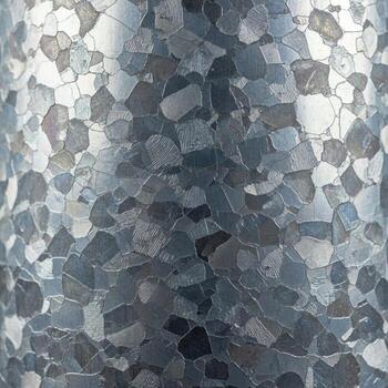 Close up abstract textured background of irregular gray and white shapes with a frosted glass effect photo