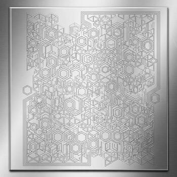 Intricate geometric metal stencil with repeating hexagonal and circular patterns for crafting and art projects photo