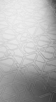 Abstract close up of a textured metallic surface with a subtle diamond pattern and light reflections photo