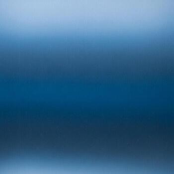 Abstract gradient of deep blues and light sky blues creating a serene and calming atmospheric visual effect photo
