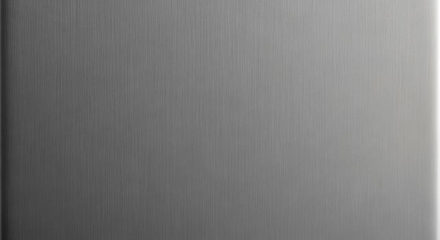 A close up abstract textured background with a gradient of light to dark gray tones photo