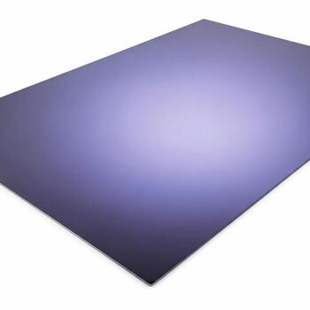 A smooth reflective dark purple surface with a subtle gradient of light and shadow across its expanse photo