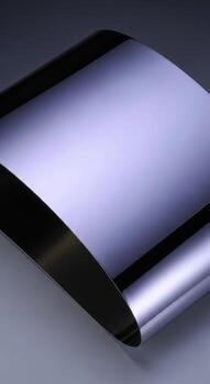 Sleek metallic surface with subtle curves and reflections on a dark background photo
