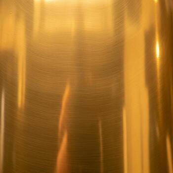 Abstract golden light streaks create a warm glowing and dynamic background with a sense of movement and energy photo