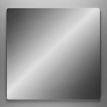 A polished metallic surface reflecting light with a diagonal gradient of brightness and shadow photo